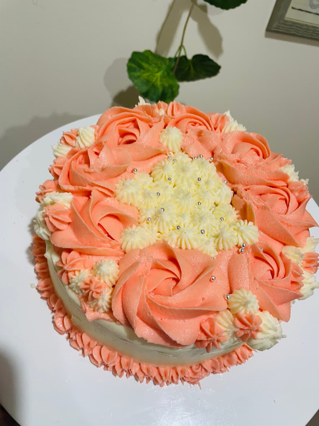 Peach rosette cake with silver pearls